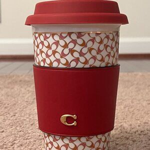 NIB Coach Pumpkin/True Pink Signature Hot Lidded Ceramic Cup with Leather Sleeve